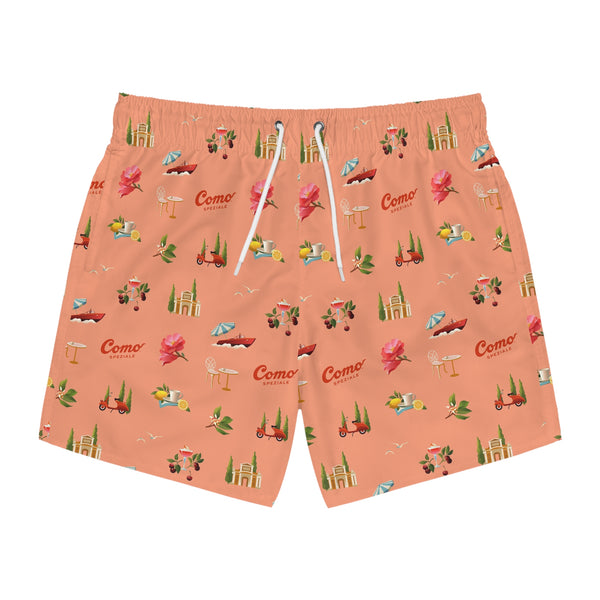 Peach-colored swim shorts with a pattern of small images and 'Como' branding on a white background.
